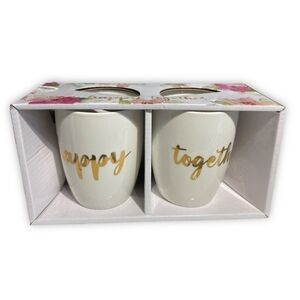 Orly "Happy Together" ceramic mugs. The mugs are white with gold lettering.